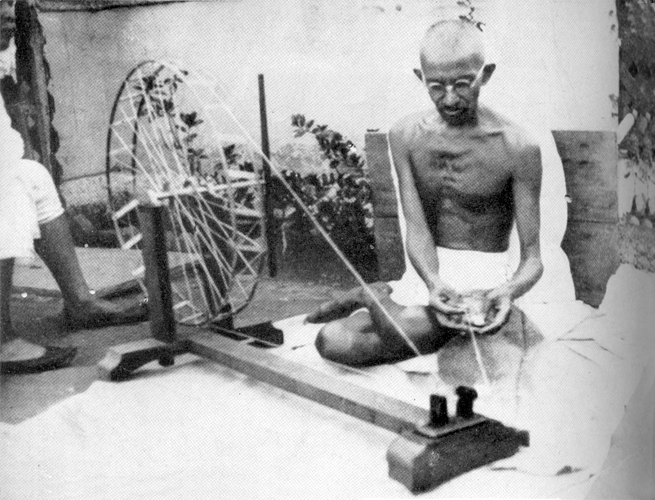 Gandhi at the spinning wheel, Sabarmati Ashram, 1925