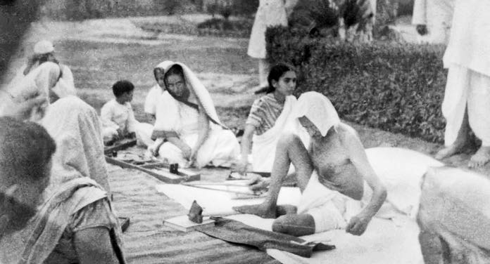 Mahatma Gandhi at Mass Spinning, Sevagram, 1941