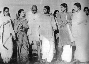 Gandhi walking to the prayer-meeting