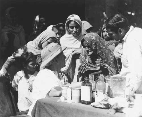 Dr. Beth Taylor caring for refugee patients during the 1947 riots that accompanied the Partition of India and Pakistan