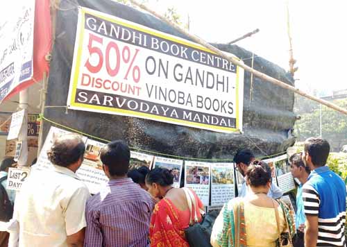 french man dressed up as Gandhi visited Gandhi books exhibition