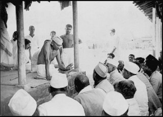 Mahatma Gandhi with villagers